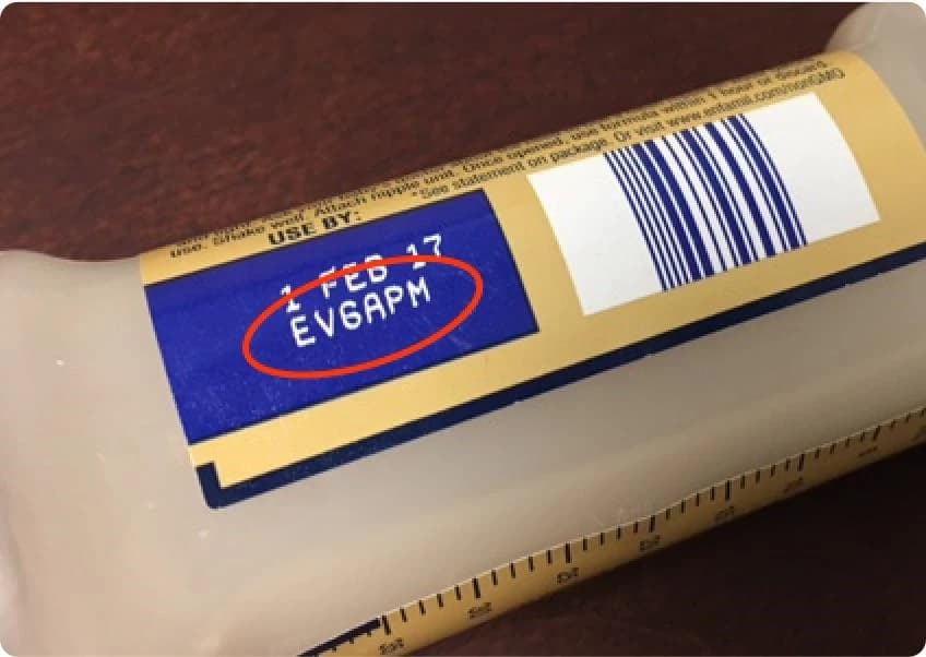 The Lot Number is near the Use By/Expiration Date