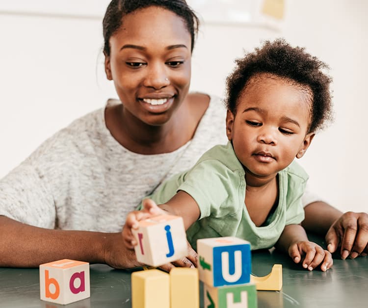 Father playing with his toddler