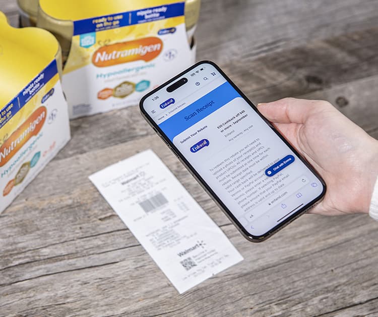 iPhone using Enfamil's "Scan Receipt" option on a paper receipt.