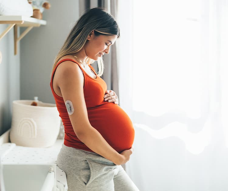 Mother watching her baby