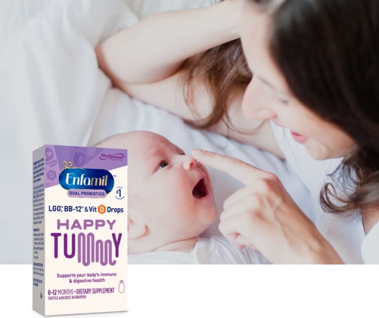 Mom and infant laying next to each other smiling, Enfamil® Dual Probiotics