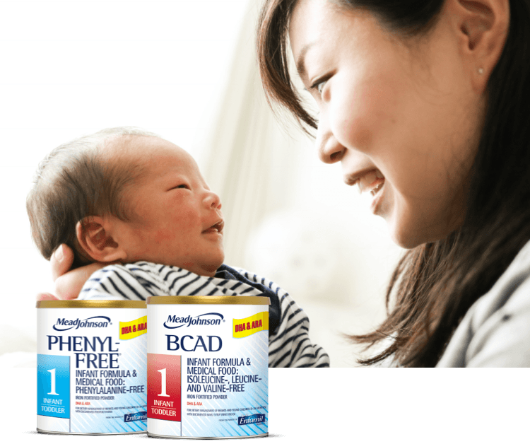 Smiling mom holding baby