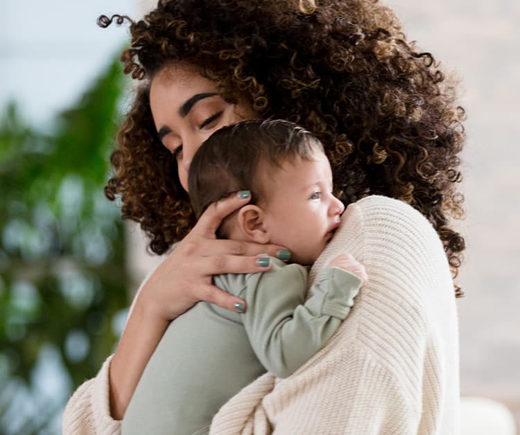 Mom comforting her fussy baby
