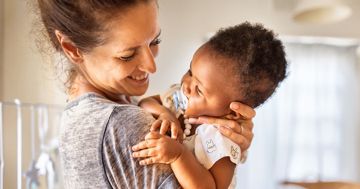 Learn why you should give your baby a pacifier to help meet their sucking reflex.